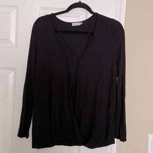 Tobi Black long sleeve, open wrap front Size S/P